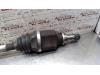 Front drive shaft, left from a Renault Modus/Grand Modus (JP) 1.4 16V 2004