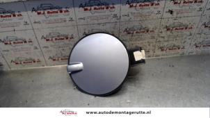 Used Tank cap cover Opel Astra H (L48) 1.6 16V Twinport Price on request offered by Autodemontage M.J. Rutte B.V.