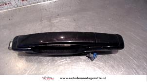 Used Rear door handle 4-door, right Ssang Yong Rexton 2.7 Xdi RX/RJ 270 16V Price on request offered by Autodemontage M.J. Rutte B.V.