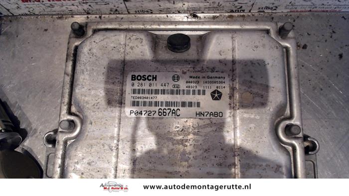 Ignition lock + computer from a Chrysler Voyager/Grand Voyager (RG/RS) 2.5 CRD 16V 2005