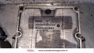 Ignition lock + computer from a Chrysler Voyager/Grand Voyager (RG/RS) 2.5 CRD 16V 2005