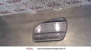 Used Mirror glass, left Ford Focus C-Max 1.6 16V Price on request offered by Autodemontage M.J. Rutte B.V.