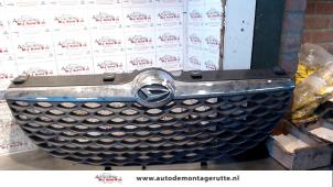 Used Grille Daihatsu Sirion/Storia (M1) 1.0 12V DVVT Price on request offered by Autodemontage M.J. Rutte B.V.