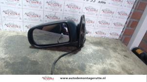 Used Wing mirror, left Mazda 323 P (BA15) 1.5i 16V Price on request offered by Autodemontage M.J. Rutte B.V.