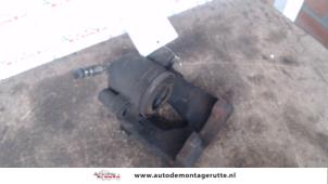 Used Front brake calliper, left Volkswagen Golf V (1K1) 1.4 FSI 16V Price on request offered by Autodemontage M.J. Rutte B.V.