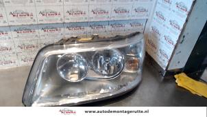 Used Headlight, left Volkswagen Transporter T5 2.5 TDi Price on request offered by Autodemontage M.J. Rutte B.V.