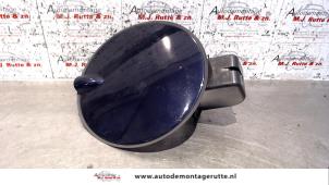 Used Tank cap cover Opel Astra G Caravan (F35) 1.6 16V Price on request offered by Autodemontage M.J. Rutte B.V.