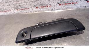 Used Front door handle 4-door, right Suzuki Baleno (GC/GD) 1.3 GL 16V Price on request offered by Autodemontage M.J. Rutte B.V.