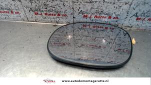 Used Mirror glass, left Citroen C2 (JM) 1.4 Price on request offered by Autodemontage M.J. Rutte B.V.