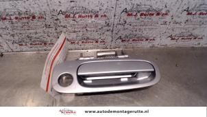 Used Door handle 2-door, right Daihatsu Copen 1.3 16V DVVT Price on request offered by Autodemontage M.J. Rutte B.V.