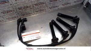 Used Spark plug cable set Nissan Almera (N15) 1.6 GX,SLX,SR 16V Price on request offered by Autodemontage M.J. Rutte B.V.