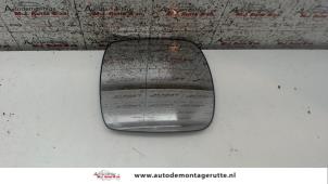 Used Mirror glass, left Renault Kangoo Express (FW) 1.5 dCi 90 FAP Price on request offered by Autodemontage M.J. Rutte B.V.