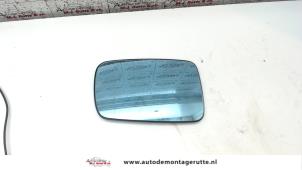 Used Mirror glass, left BMW 3 serie (E46/2) 323 Ci 24V Price on request offered by Autodemontage M.J. Rutte B.V.