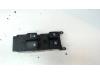 Multi-functional window switch from a Hyundai Accent 1.6i 16V 2010