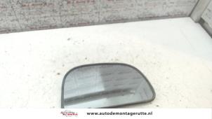 Used Mirror glass, right Mitsubishi Colt (CJ) 1.3 16V Price on request offered by Autodemontage M.J. Rutte B.V.