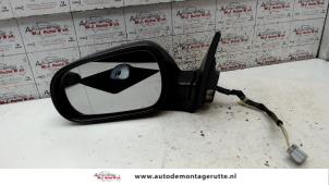 Used Wing mirror, left Mitsubishi Colt (CJ) 1.3 16V Price on request offered by Autodemontage M.J. Rutte B.V.