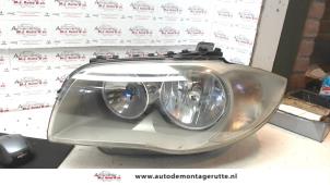 Used Headlight, left BMW 1 serie (E87/87N) 118d 16V Price on request offered by Autodemontage M.J. Rutte B.V.
