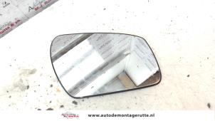 Used Mirror glass, right Ford Fiesta 5 (JD/JH) 1.4 TDCi Price on request offered by Autodemontage M.J. Rutte B.V.