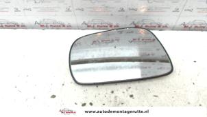 Used Mirror glass, left Fiat Punto II (188) 1.2 60 S Price on request offered by Autodemontage M.J. Rutte B.V.