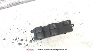 Used Multi-functional window switch Nissan Note (E11) 1.5 dCi 86 Price on request offered by Autodemontage M.J. Rutte B.V.