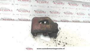 Used Front brake calliper, left Volkswagen Golf V (1K1) 1.6 FSI 16V Price on request offered by Autodemontage M.J. Rutte B.V.