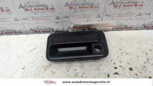 Used Door handle 4-door, front left Suzuki Swift (SF310/413) 1.3i 5-Drs. Price on request offered by Autodemontage M.J. Rutte B.V.