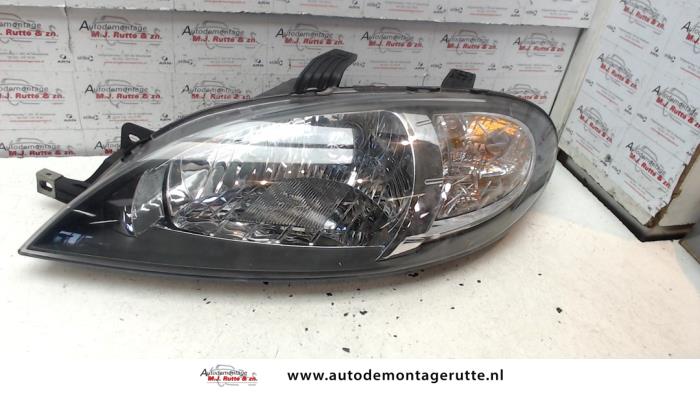 Używane Reflektor lewy Chevrolet Lacetti (KLAN) 1.6 16V Cena na żądanie oferowane przez Autodemontage M.J. Rutte B.V.