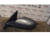 Wing mirror, left from a Volvo S60 I (RS/HV) 2.4 D5 20V 2004