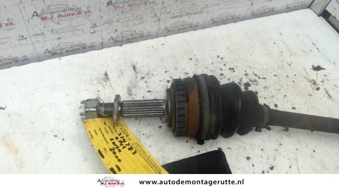 Front drive shaft, right from a Opel Corsa C (F08/68) 1.4 16V 2000