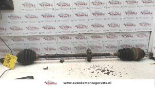 Used Front drive shaft, right Opel Astra G (F08/48) 1.6 Price on request offered by Autodemontage M.J. Rutte B.V.
