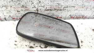 Used Mirror glass, left Toyota Yaris (P1) 1.0 16V VVT-i Price on request offered by Autodemontage M.J. Rutte B.V.