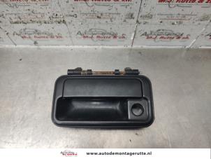 Used Door handle 4-door, front left Suzuki Swift (SF310/413) 1.0i 5-Drs. Price on request offered by Autodemontage M.J. Rutte B.V.