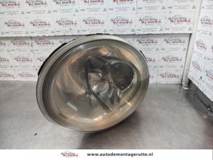 Used Headlight, left Volkswagen New Beetle (9C1/9G1) 2.0 Price on request offered by Autodemontage M.J. Rutte B.V.