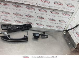 Used Front door handle 4-door, right Volkswagen Golf VI (5K1) 1.2 TSI BlueMotion Price on request offered by Autodemontage M.J. Rutte B.V.
