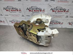 Used Door lock mechanism 4-door, front left Ford Mondeo III 1.8 16V Price on request offered by Autodemontage M.J. Rutte B.V.