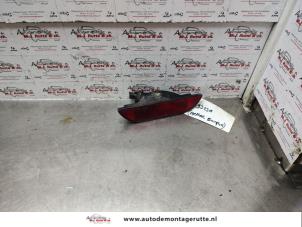 Used Rear bumper reflector, right Nissan Note (E11) 1.4 16V LPG Price on request offered by Autodemontage M.J. Rutte B.V.