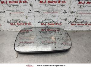 Used Mirror glass, left Renault Clio III (BR/CR) 1.4 16V Price on request offered by Autodemontage M.J. Rutte B.V.