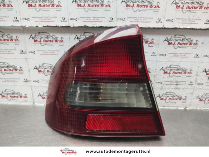 Taillight, left from a Subaru Legacy (BE) 2.0 16V 2000