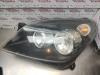 Headlight, left from a Opel Astra H SW (L35), 2004 / 2014 1.8 16V, Combi/o, Petrol, 1.796cc, 92kW (125pk), FWD, Z18XE; EURO4, 2004-08 / 2010-10, L35 2006