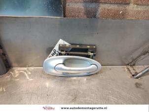 Used Rear door handle 4-door, right Saab 9-3 Sport Estate (YS3F) 1.8t 16V Price on request offered by Autodemontage M.J. Rutte B.V.