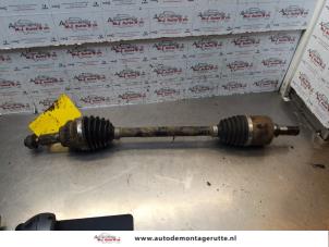 Used Front drive shaft, left Subaru G3X Justy 1.3 16V AWD Price on request offered by Autodemontage M.J. Rutte B.V.
