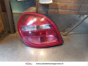 Used Taillight, left Nissan Almera (N16) 1.5 16V Price € 75,00 Margin scheme offered by Autodemontage M.J. Rutte B.V.