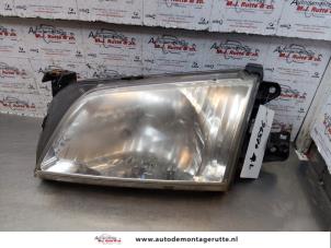 Used Headlight, left Mazda Demio (DW) 1.3 16V Price on request offered by Autodemontage M.J. Rutte B.V.