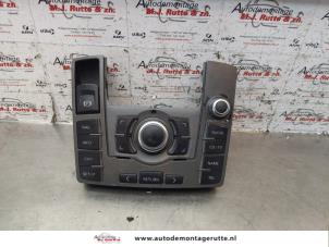 Used Radio control panel Audi A6 Avant (C6) 3.0 TDI V6 24V Quattro Price on request offered by Autodemontage M.J. Rutte B.V.