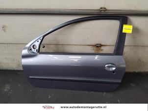 Used Door 2-door, left Peugeot 206+ (2L/M) 1.4 XS Price on request offered by Autodemontage M.J. Rutte B.V.