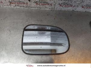 Used Mirror glass, right Suzuki Swift (SF310/413) 1.0i Price on request offered by Autodemontage M.J. Rutte B.V.