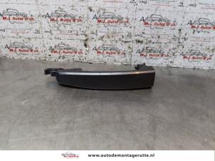 Used Door handle 4-door, front left Opel Astra J Sports Tourer (PD8/PE8/PF8) 1.4 16V ecoFLEX Price on request offered by Autodemontage M.J. Rutte B.V.