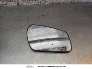Used Mirror glass, right Ford Focus C-Max 1.8 16V Price on request offered by Autodemontage M.J. Rutte B.V.