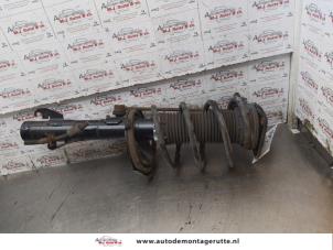 Used Front shock absorber rod, left Mazda 3 Sport (BK14) 2.0i 16V Price on request offered by Autodemontage M.J. Rutte B.V.