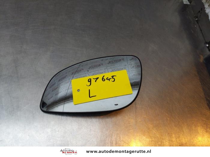 Mirror glass, left from a Opel Signum (F48) 1.8 16V 2004